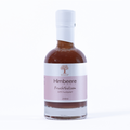 Fruchtbalsam Himbeere mit 52 % Fruchtanteil – intensiv fruchtiger Himbeer-Balsamico mit leuchtend roter Farbe für Desserts, Salate und feine Küche.