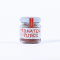 Tomatenpuder aus der Toskana – feines Pulver aus sonnengereiften, schonend getrockneten Tomaten für Pasta, Salate, Gemüse und mediterrane Küche.